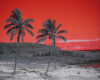 Two leaning palm trees on a sandy beach under a vivid red sunset sky.