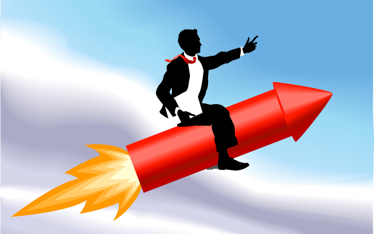 Silhouette of a man in a suit riding a red rocket into the sky, suggesting fast growth or a bold launch.