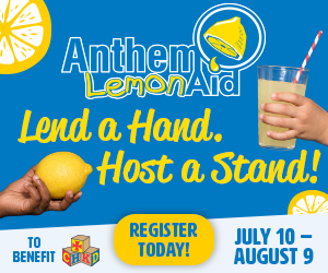 Bright blue Anthem LemonAid banner with a hand holding a lemon, a glass of lemonade, and the slogan 'Lend a Hand, Host a Stand!'